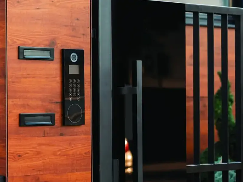 Video door panel with keypad mounted on a villa gate pillar