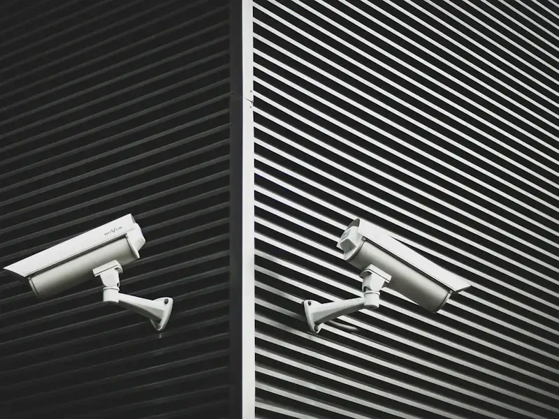 Security cameras mounted on a modern exterior wall